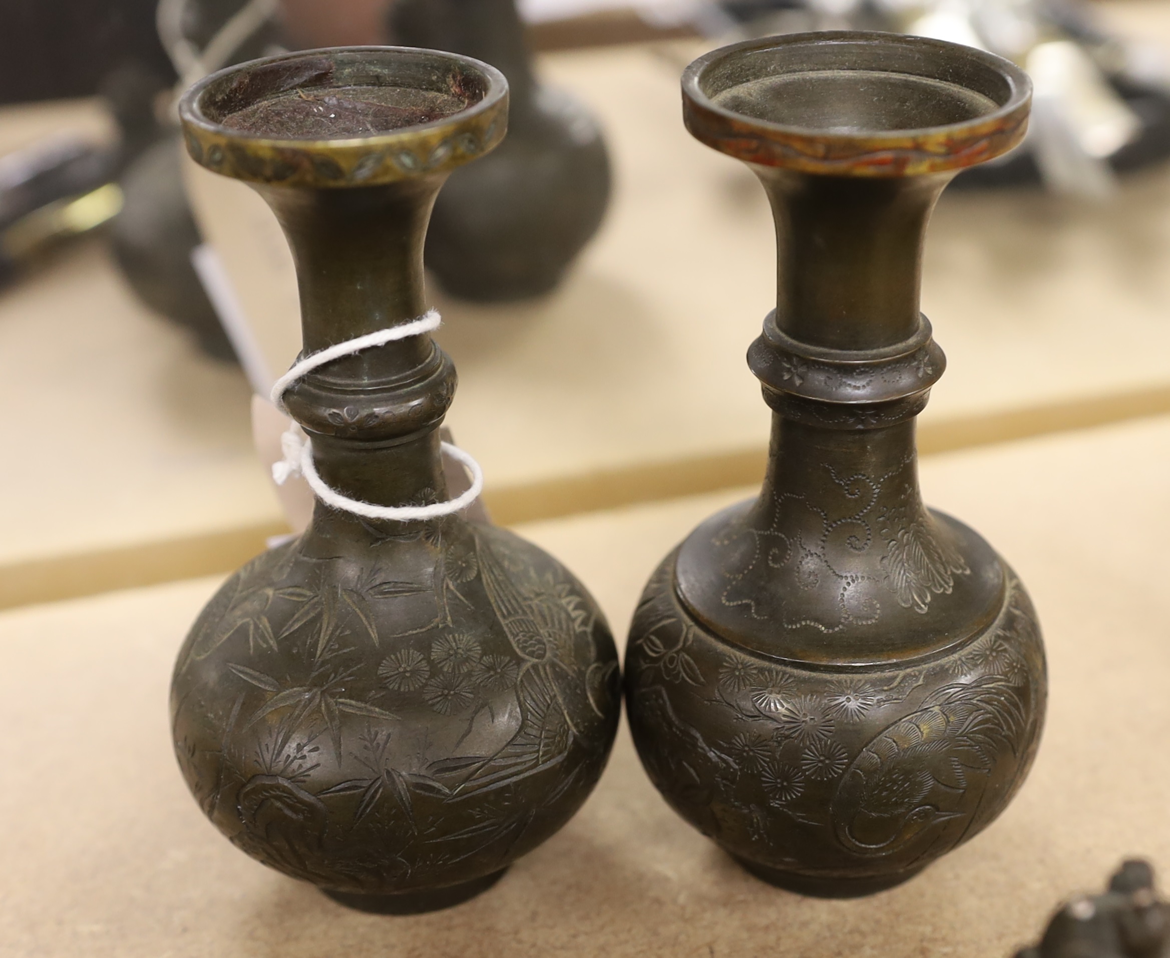 A set of Burmese bronze weights and a pair of bronze vases, 12cm